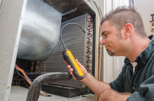 DIY man check ac heater shutterstock  e