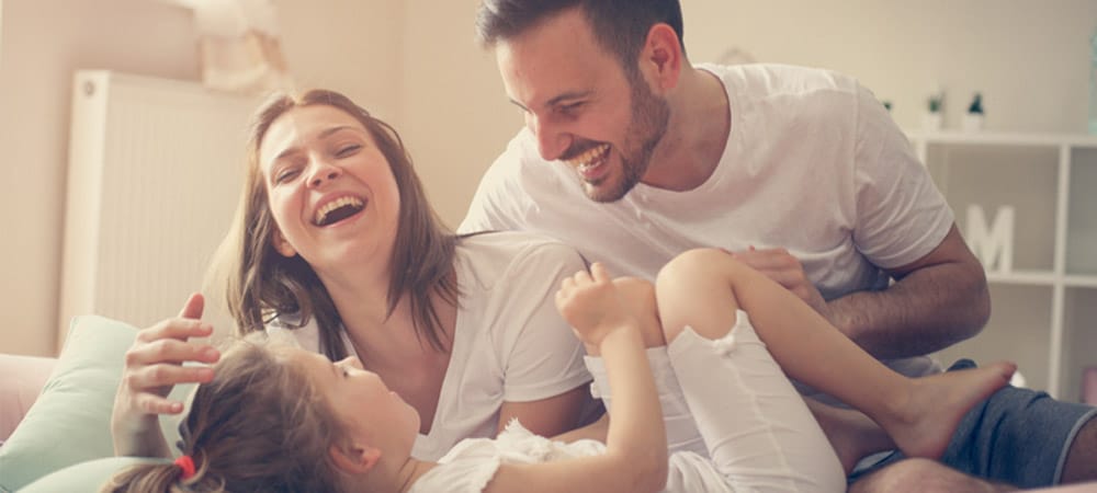 Family In Air Conditioned Room