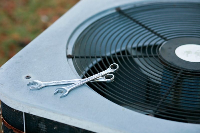 Wrenches On Top Of HVAC Unit